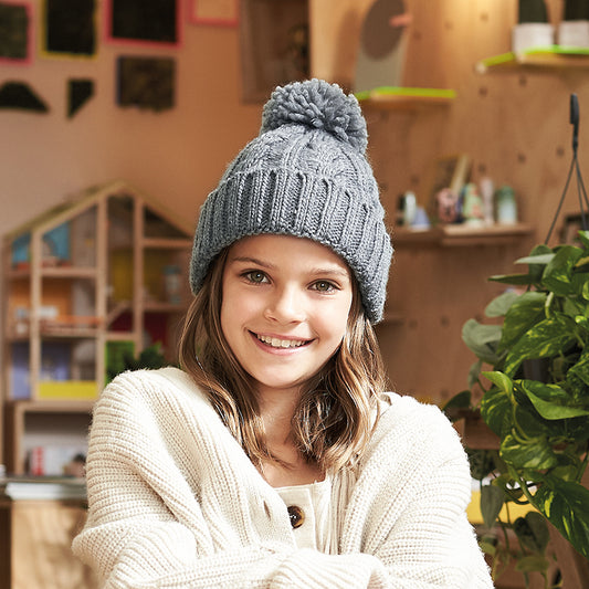 Bonnet à pompon torsadé